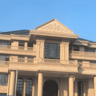 汕头黄金麻别墅外墙干挂石材效果示例